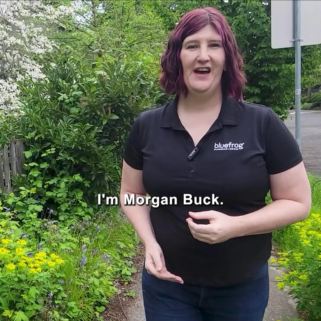 Morgan on a garden path in a work polo, a still from the video ad we made and ran for our own business.